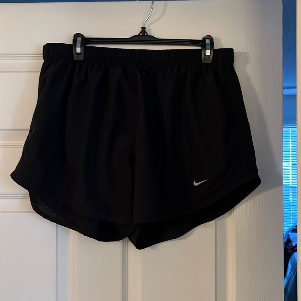 Women’s Nike DRI-FIT running shorts, size XXL.